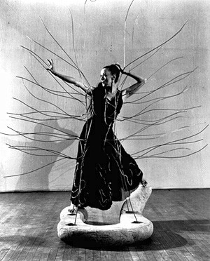 Martha Graham in Medea's dress from Cave of the Heart, stage set designed by Isamu Noguchi in 1946
