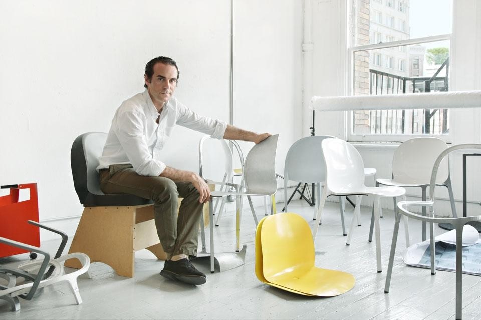 Jonathan Olivares in his studio with a series of prototypes and structural parts for the <em>OAC</em>