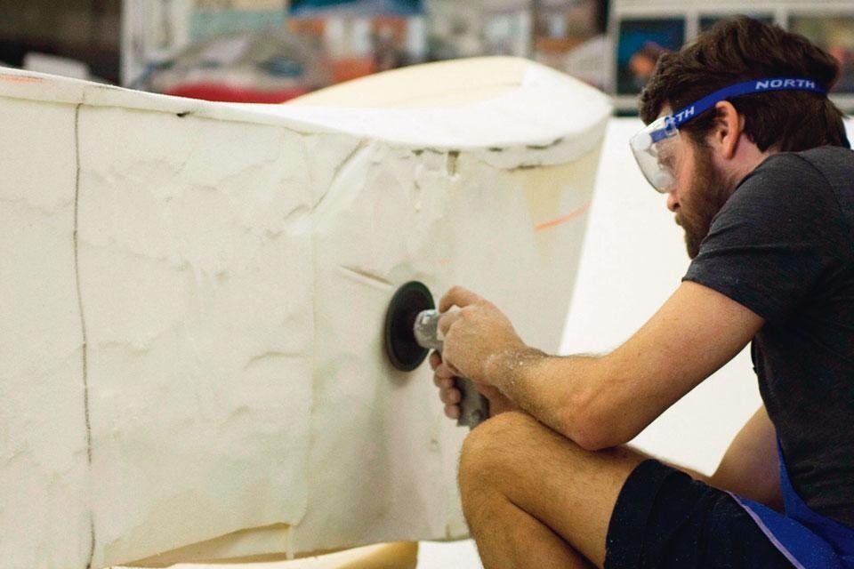 Martino Gamper working on the pieces selected for the show at HangarBicocca, titled "Metamorfosi_Behind, After or Beyond". Gamper reinterpreted seating designs by Moroso via the concept of metamorphosis—modifying their shapes and upholstery fabrics. Photo Giuliana De Luca