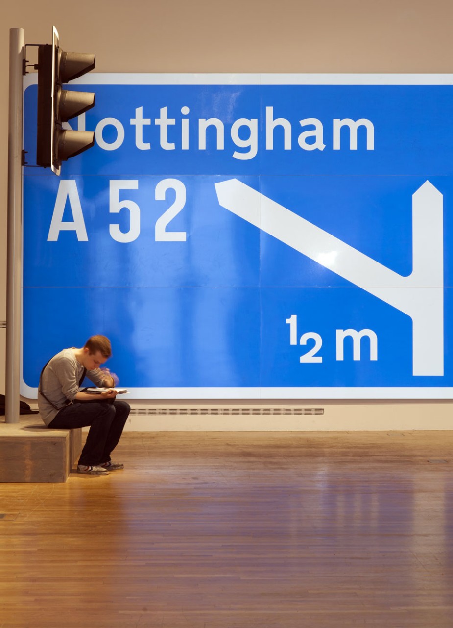 <em>Extraordinary Stories About Ordinary Things</em>, installation view at the Design Museum, London, 2013. Left, David Mellor's traffic light. In the background, Margaret Calvert and Jock Kinneir's signage for the British road system, 1957-67