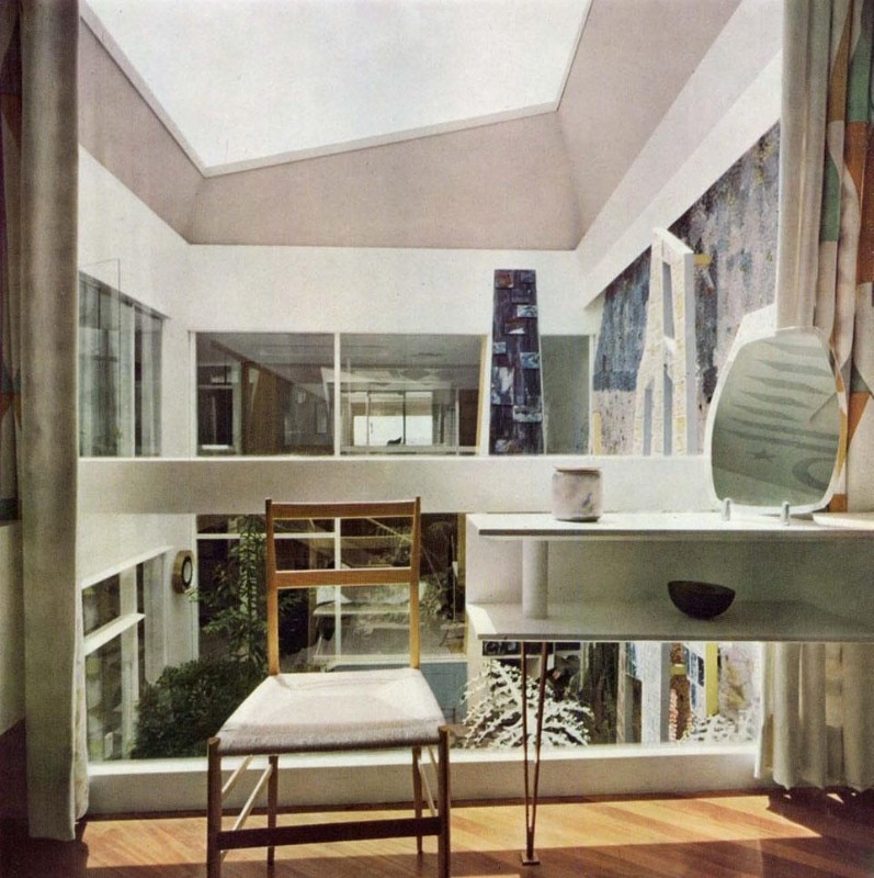 Upstairs, the guest room: from here there is a deep perspective view (one of the seven perspective views crossing the body of the house that were studied in the project) from the bedroom to the patio, to the staircase, the window above the entrance to the sky. Note how  the top edge of the ceramic patio wall is inclined inward and screened. At night, the light rains 'moonily' from above (behind the screen) bathing the wall