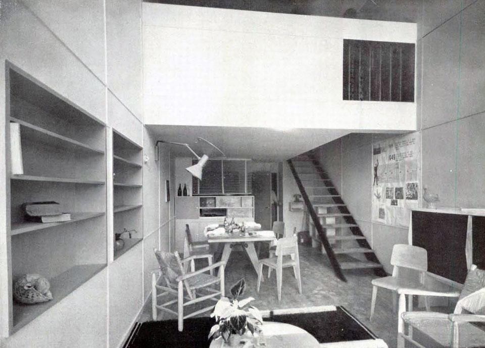 The living room of a typical dwelling unit; the interior staircase leads to the bedrooms. The living room of a typical dwelling unit; the interior staircase leads to the bedrooms.