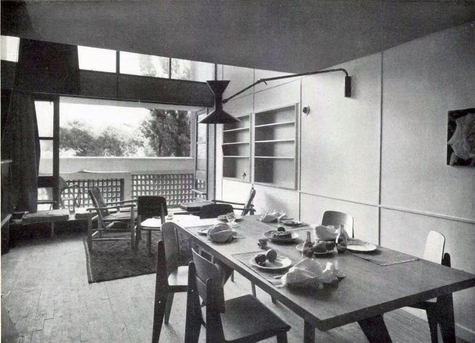 The living and dining room of a typical dwelling unit  with the balcony on the main facade.