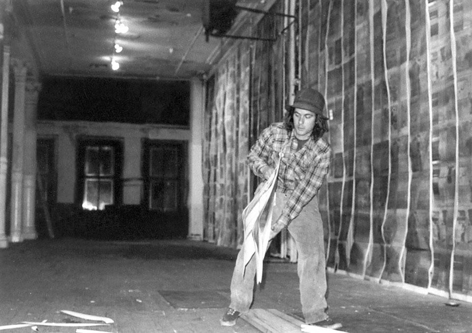 Gordon Matta-Clark installing <i>Walls Paper</i>,, 1972 at 112 Greene Street. Photograph by Cosmos Andrew Sarchiapone.