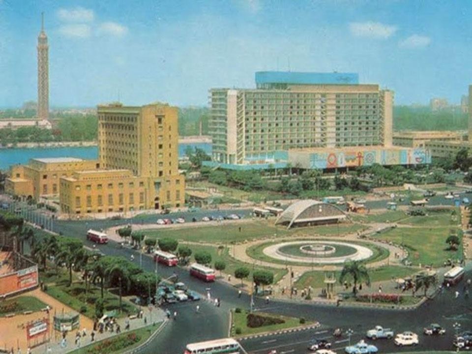 Tahrir Square, in the early 1960s. In the background, the former Nile Hilton. Vintage postcard courtesy of Mohamed Elshahed, image courtesy of <a href="http://places.designobserver.com/feature/tahrir-square-social-media-public-space/25108/" target="_blank">Design observer</a>