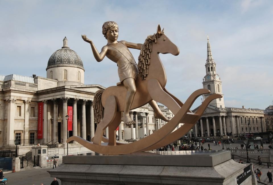 Top from left: Ingar Dragset and Michael Elmgreen in their studio. Photo copyright Gautier Deblonde. Above: <em>Powerless Structures, Fig 101</em> in Trafalgar Square. Photo copyright James O Jenkins