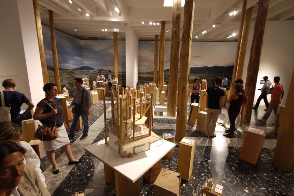 Top: Toyo Ito, curator of the Japan Pavilion at the 13th Venice Architecture Biennale. Photo by María Carmona. Above: <em>Architecture. Possible here? Home-for-All</em> installation view at the Japan Pavilion. Photo by Naoya Hatakeyama Top: Toyo Ito, curator of the Japan Pavilion at the 13th Venice Architecture Biennale. Photo by María Carmona. Above: <em>Architecture. Possible here? Home-for-All</em> installation view at the Japan Pavilion. Photo by Naoya Hatakeyama