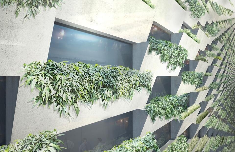 From a distance, the entire building is wrapped in a vertical green façade formed by planter modules stacked like bricks turning it into
a mountain from afar. 