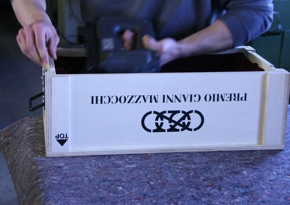 The trophy’s wooden box was also designed and produced by Kram/Weisshaar