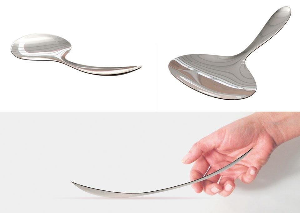 With a deep and unconventional curve, Aldo Bakker's spoon balances on the table, waiting to be used.