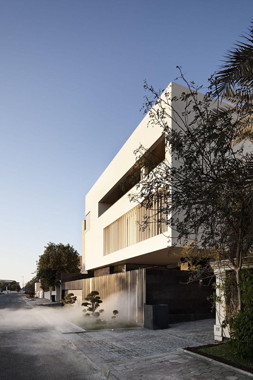 The street-side facade with covered terrace.