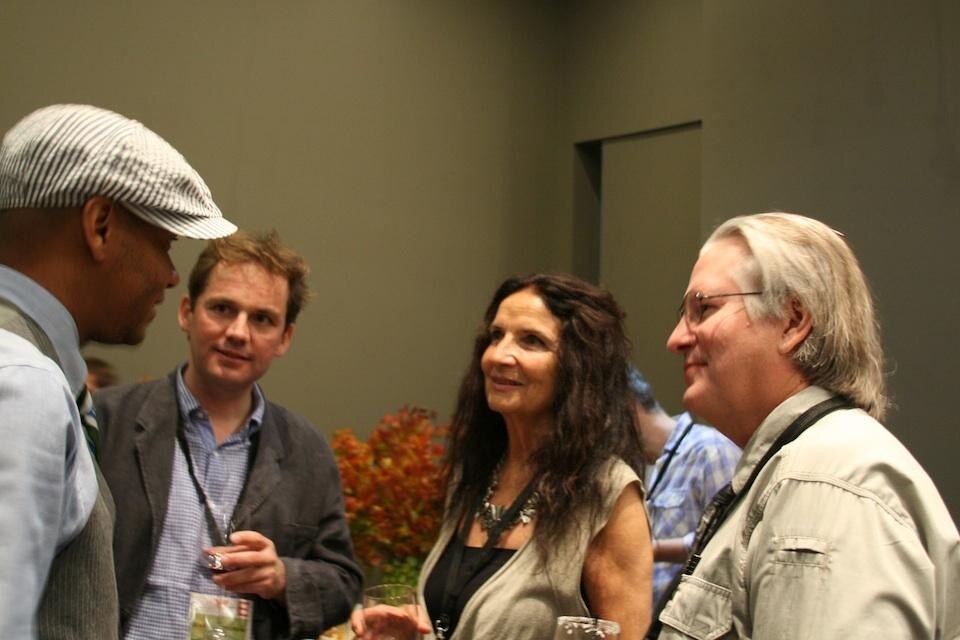 Paul Miller aka DJ Spooky That Subliminal Kid, Lita Albuquerque, and Bruce Sterling at the opening reception to the 2011 Art + Environment Conference.