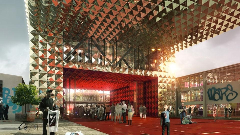 The Danish Rock Museum is the main focus of the masterplan with a facade of gold colored spikes.