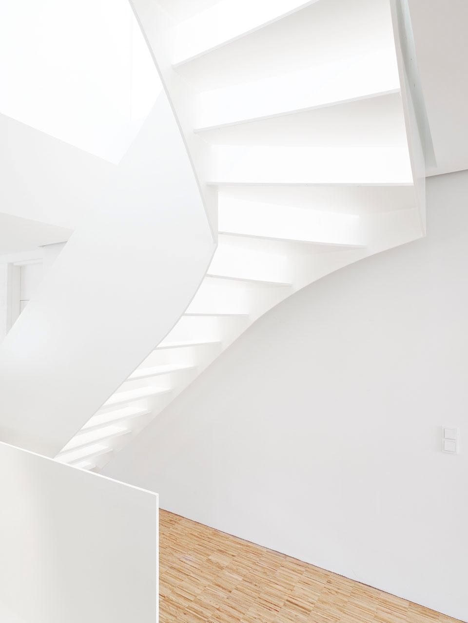 A skylight illuminates the staircase