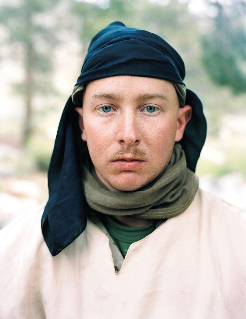 Top: Above Medina Jabal Town, National Training Center,
Fort Irwin, CA, 2009.
30 x 40 in.,
Courtesy Dave Greenblatt, Boston; above:
Marine Lance Corporal Joshua Stevens playing the
role of a Taliban fighter, Marine Corps Mountain
Warfare Training Center, CA, 2009,
40 x 30 in. Courtesy of the artist and Carroll
and Sons, Boston
