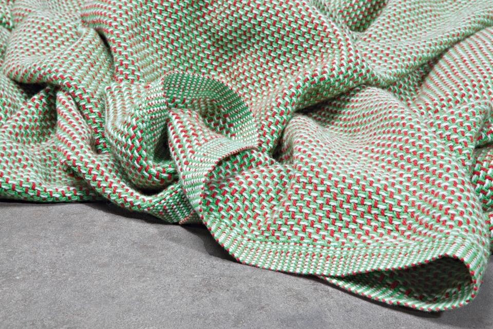 The classical Swiss hospital blanket is modified in terms of colour. Design: Isabel Burgin. Photo Ralph Humrich