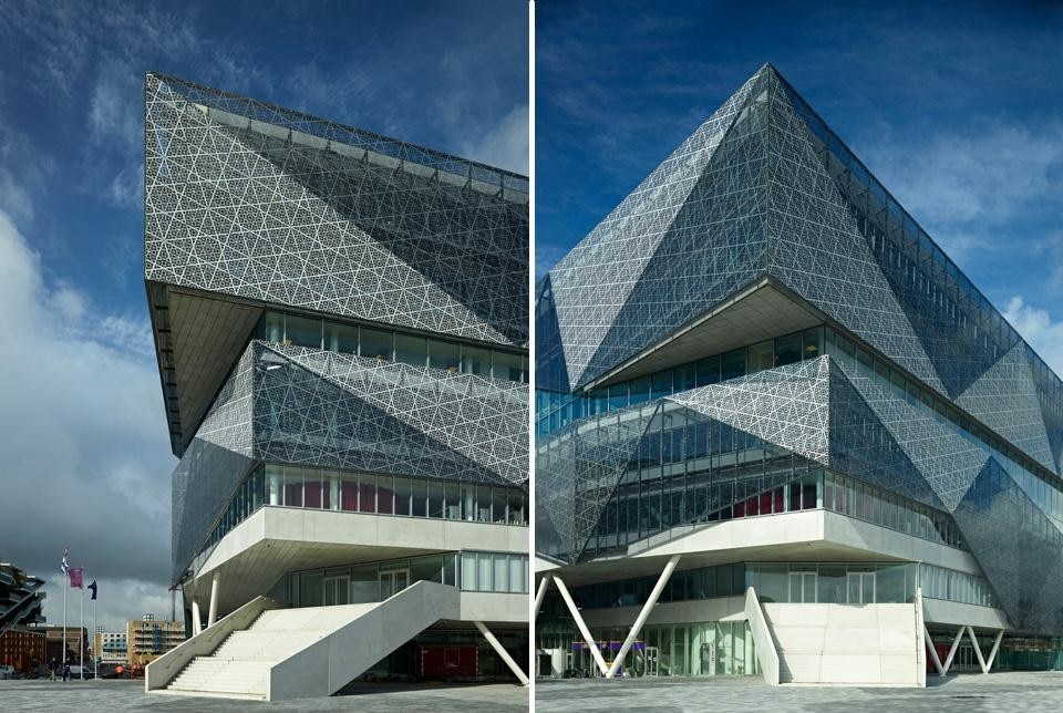 The exterior façade of silkscreened glass folds around the building, without covering it completely