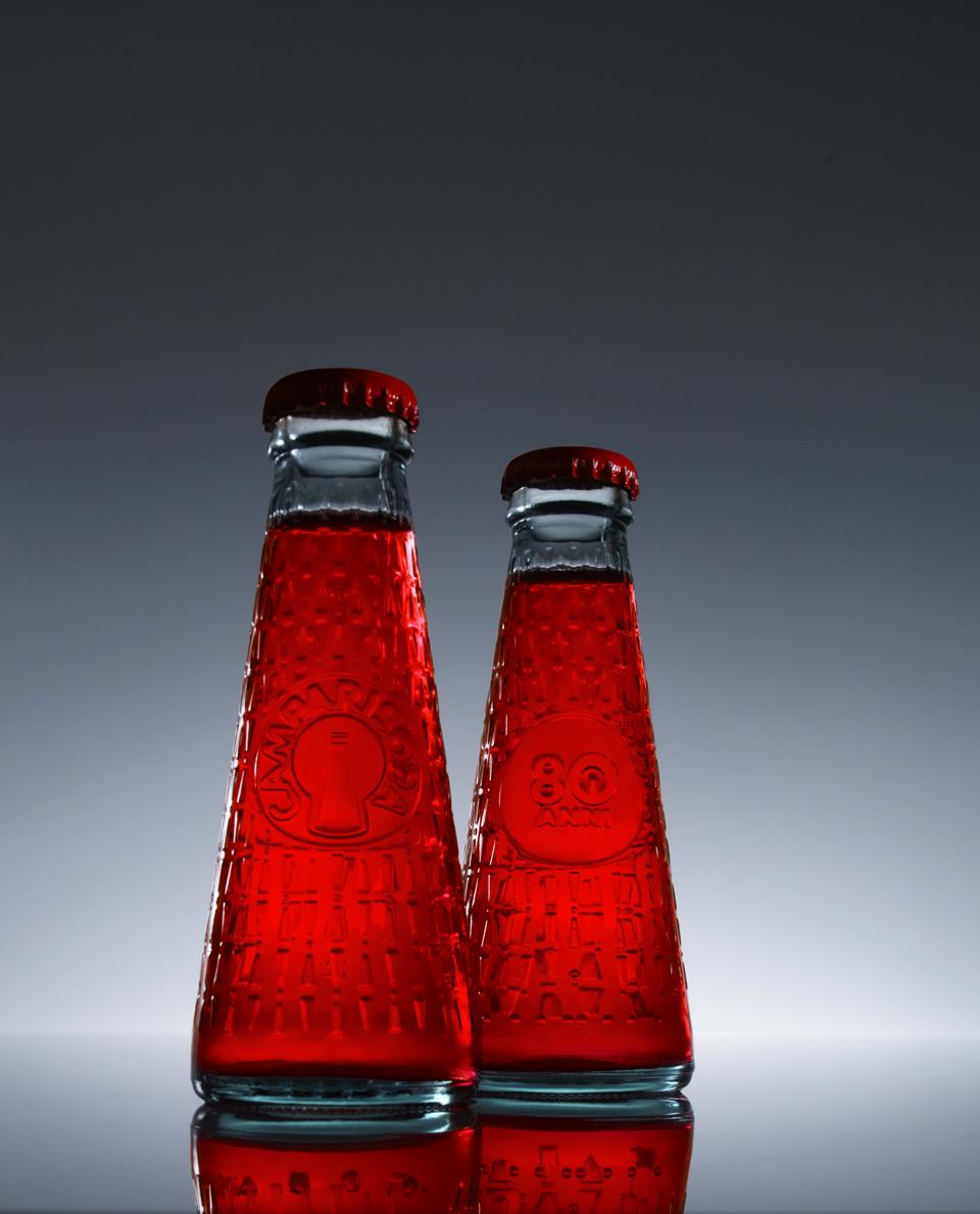The new Camparisoda bottle, designed by Matteo Ragni on the occasion of the brand's 80th anniversary. Photo by Max Rommel The new Camparisoda bottle, designed by Matteo Ragni on the occasion of the brand's 80th anniversary. Photo by Max Rommel