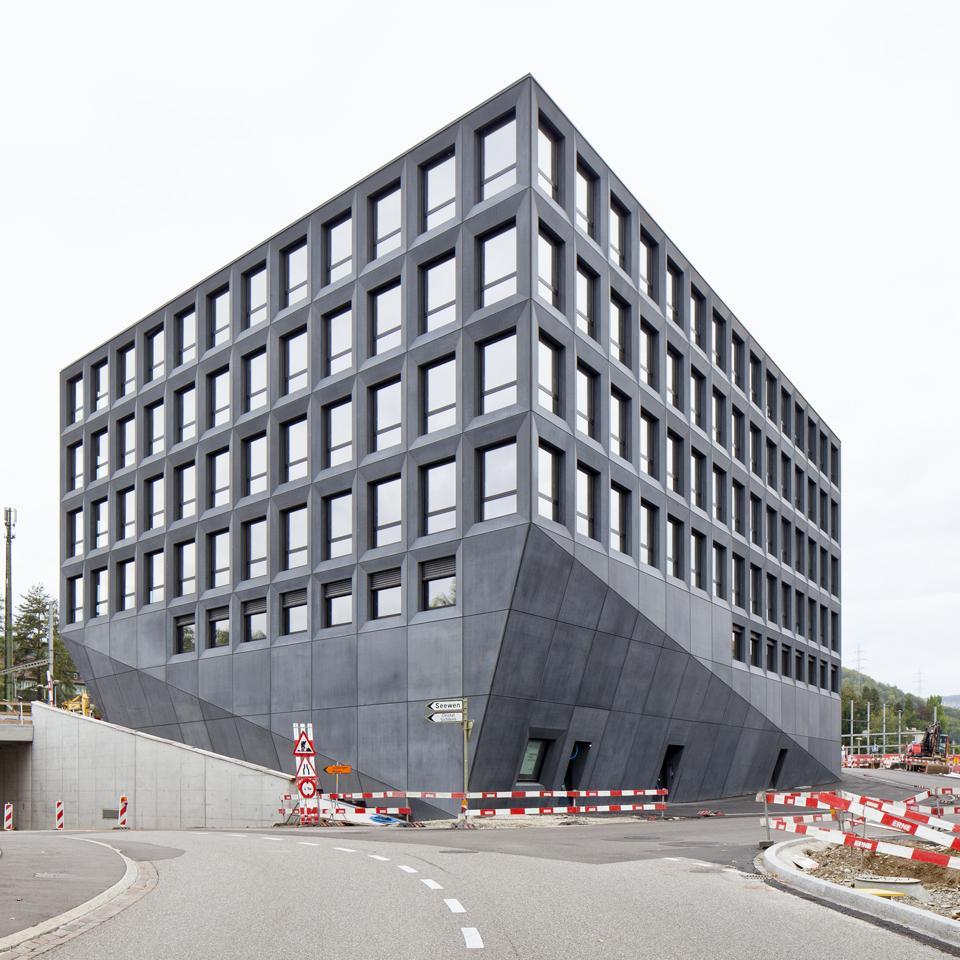 Top: Alicja Dobrucka, bunker in Drymades, August 2011. Above: Christ & Gantenbein's BLKB bank is not an over ambitious luxury project, but a pragmatic cask-like building, with only a couple of well designed things: the windows and the façade are the protagonists
