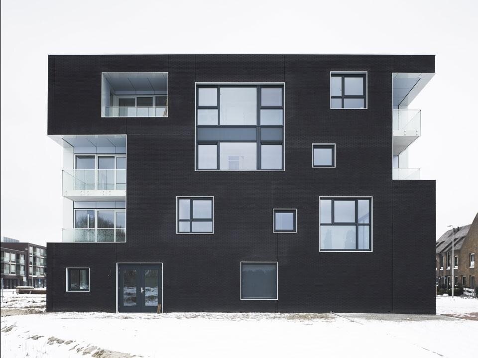 Casanova + Hernandez Architects, <em>Black & White Twins</em> housing complex