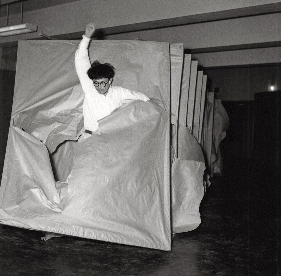 Top: Janine Antoni, documentation of the performance <em>Loving Care</em>, 1993.
© Courtesy of the artist and Luhring Augustine, New York. Photo by Prudence Cumming Associates. Above: Saburo Murakami, <em>Tsuka (Passage)</em>, 1956. © Makiko Murakami and the former members of the Gutai Art Association. Courtesy of Museum of Osaka University. From the 2nd Gutai Art Exhibition, Ohara Kaikan hall, Tokyo