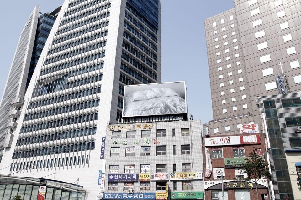Top: Felix Gonzalez-Torres, <em>Placebo</em>. Above: Felix Gonzalez-Torres, <em>Untitled</em> at the Korea Post Office