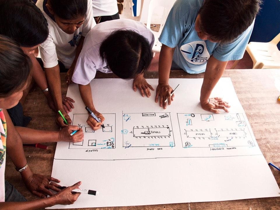 A drawing workshop to define the centre's final form. Photo by Nerren Homeres