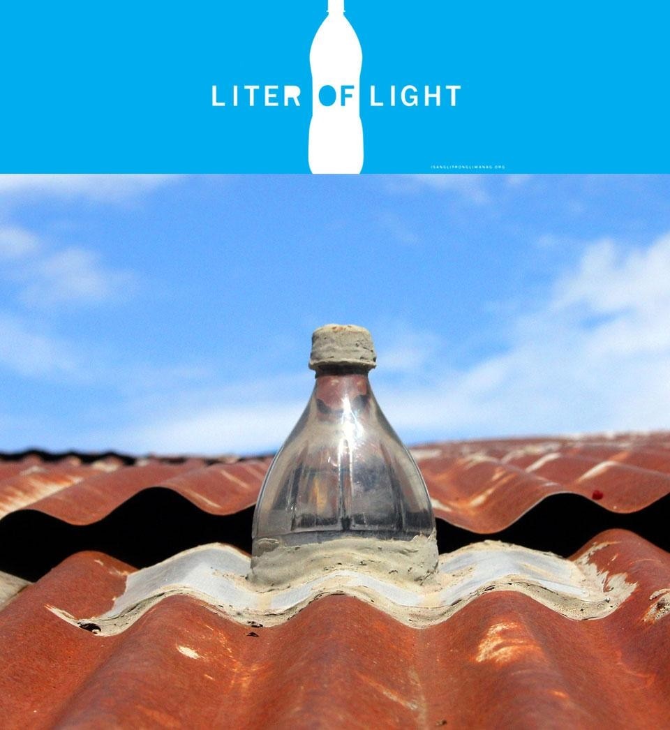 Liter of Light top of the roof (photo) and logo. Liter of Light installed in a typical metal roof. Photo by Jeminah Ferrer