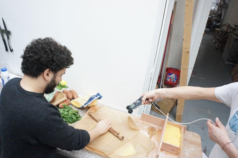 Top: Breadsticks at the <em>Point and Line to Plate</em> event. Photo by Matylda Krzykowski. Above: Jonas Loellmann records the tunes of the cooking process