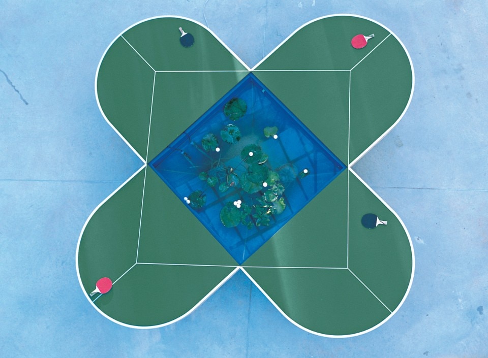 Gabriel Orozco, <i>Ping-Pond Table</i>, 1998, deformed ping-pong tables, ping-pong rackets, ball,water tank, pump filter, water lilies, H76.7 × W424.5 × D424.5cm. Collection: 21st Century Museum of Contemporary Art, Kanazawa 