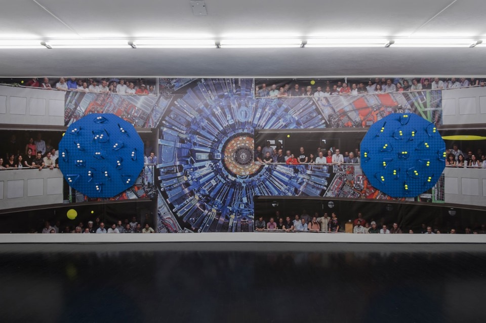 Luca Pozzi, <i>Detectors</i>, 2015. Exhibition view at Spazio 22, FL Gallery : Photo © Cosimo Filippini. Background image ©: CERN (LHC, Atlas Detector) and Michael Hoch (CMS Experiment)