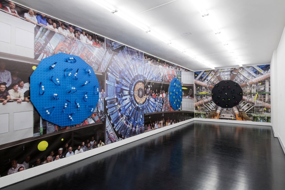 Luca Pozzi, <i>Detectors</i>, 2015. Exhibition view at Spazio 22, FL Gallery : Photo © Cosimo Filippini. Background image ©: CERN (LHC, Atlas Detector) and Michael Hoch (CMS Experiment)