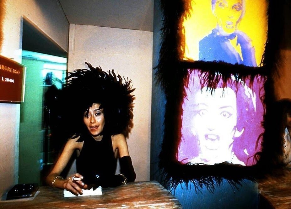 Micaela Zanni sits at the entrance of Kinki Club, 1990. Photo courtesy of Micalea Zanni
