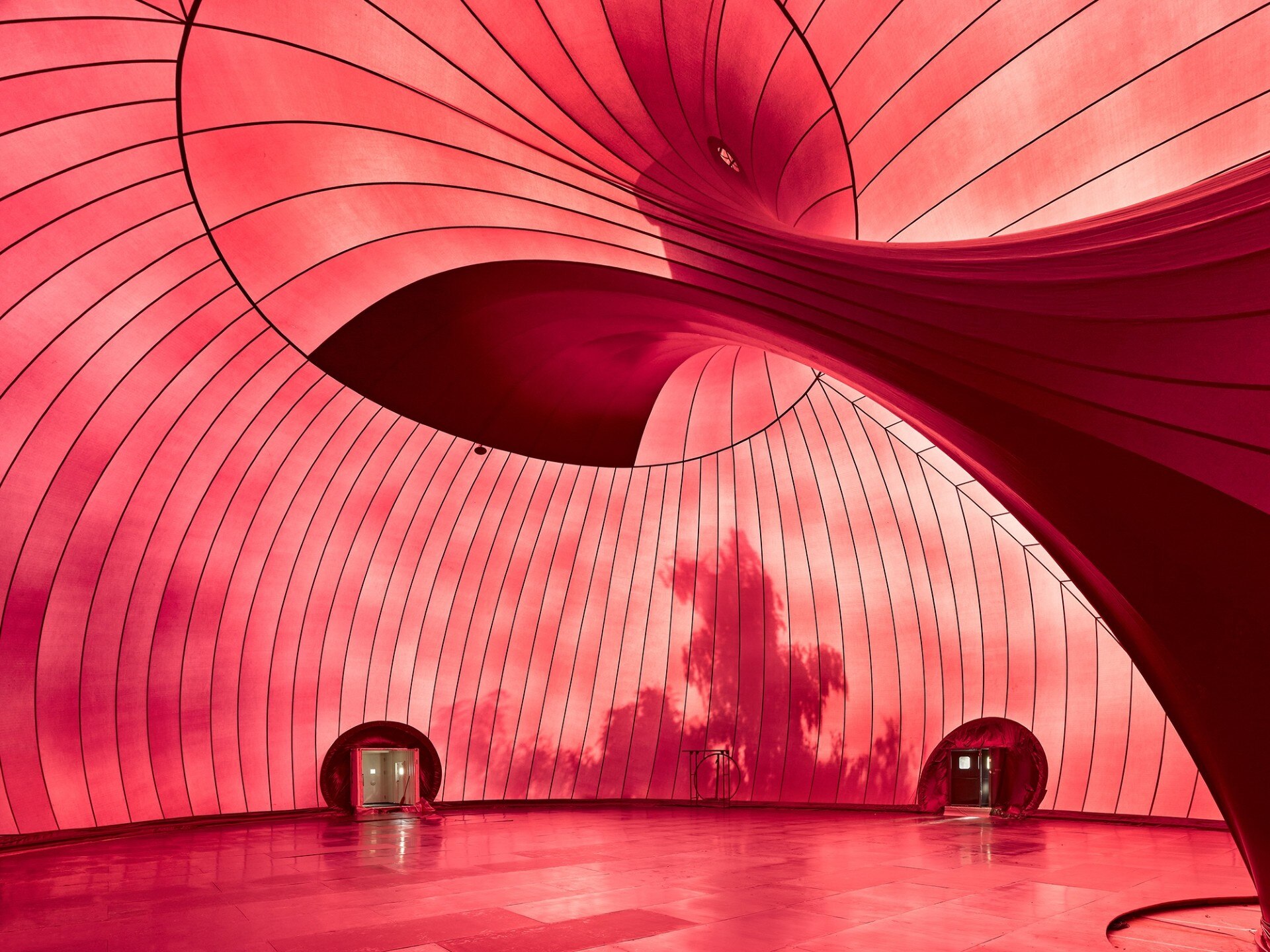 Isozaki and Kapoor's inflatable concert hall, usually in Japan, is