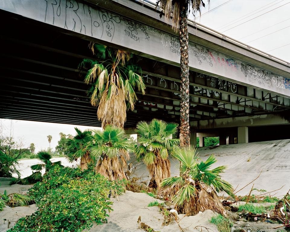 March 2010,
Los Angeles River,
Glendale, CA, US. The Los Angeles River was
the primary source of water
for the natives of the basin. The
river’s unpredictably torrential
character, along with the flood
of 1938, led to the decision to
line its banks and bed almost
entirely with concrete to create
a flood control channel