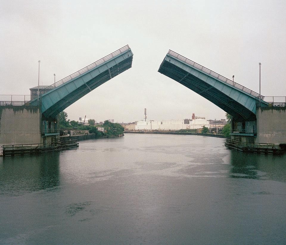 J. J. Byrne Memorial Bridge, from Newtown Creek main channel. From <i>Newtown Creek: A Photographic Survey of New York's Industrial Waterway </i>by Anthony Hamboussi - Princeton Architectural Press, 2010 