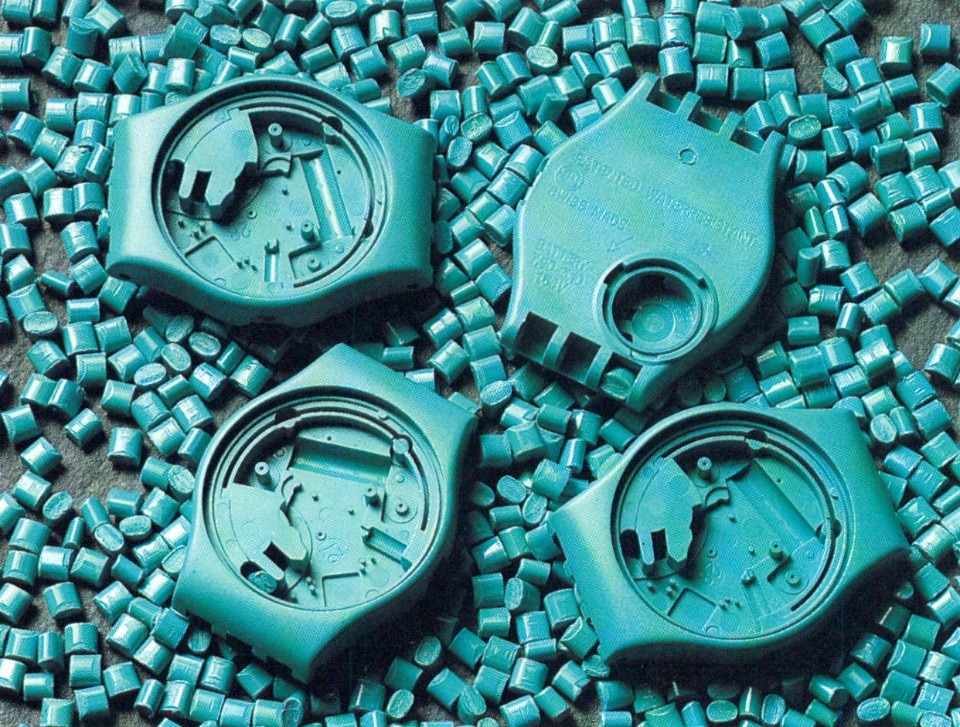 Cases of the women's wristwatch by Swatch, showing granules of unmelted plastic