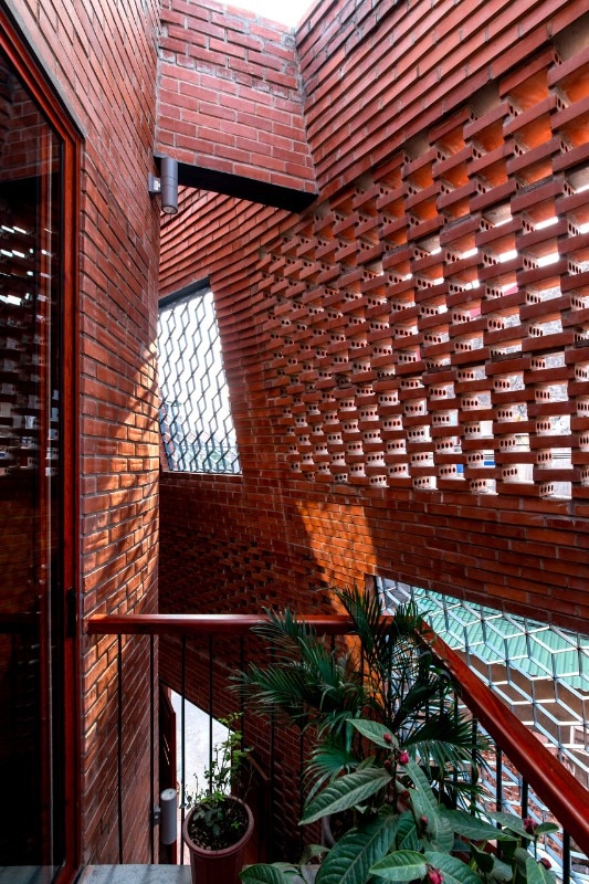 Vietnam. Designed by H&P Architects, a double brick shell encloses