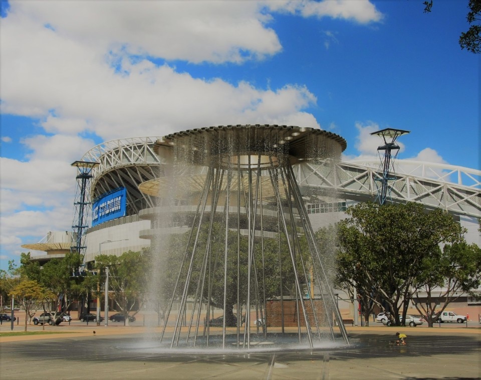 The Olympic cauldron turned into a fountain in front of Syndey Olympic Park in 2009. Photo Adam.J.W.C. on Wikimedia Commons