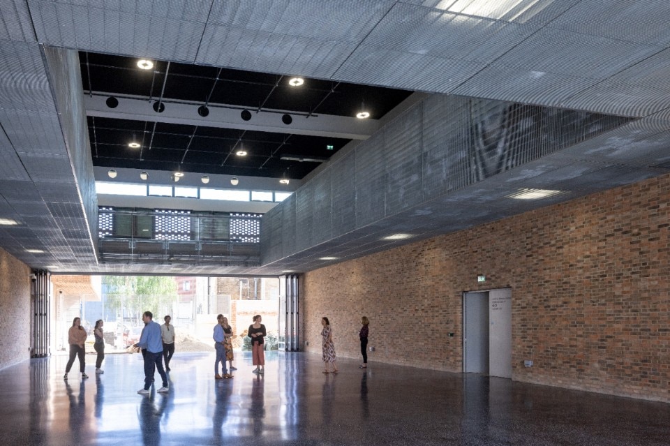 The large-scale Hangar in the Royal College of Art's new £135m design and innovation campus, designed by Herzog & de Meuron. Photo © Iwan Baan