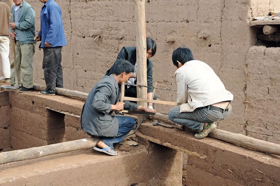 Più della metà delle famiglie
del villaggio ha utilizzato
una tecnologia costruttiva
che ha comportato loro un
costo inferiore ai 100 RMB
al metro quadrato