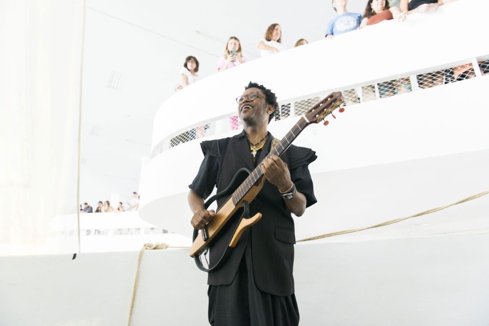 Performance by Neo Muyanga during the opening day of the Bienal. Photo © Levi Fanan, courtesy Fundação Bienal de São Paulo