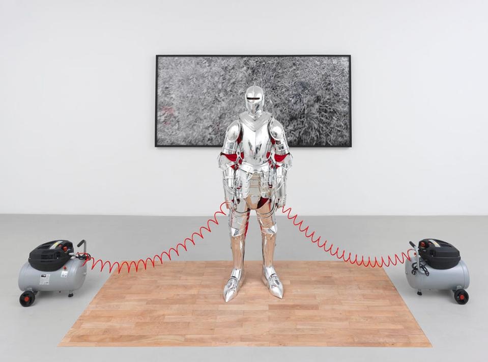 Pietro Roccasalva, <i> 
Truka all-over (The Formula of the Phantom)</i>, 
2010. Performance: due performer, armature rivestite in argento, acrylic, pittura spray, compressori. 
