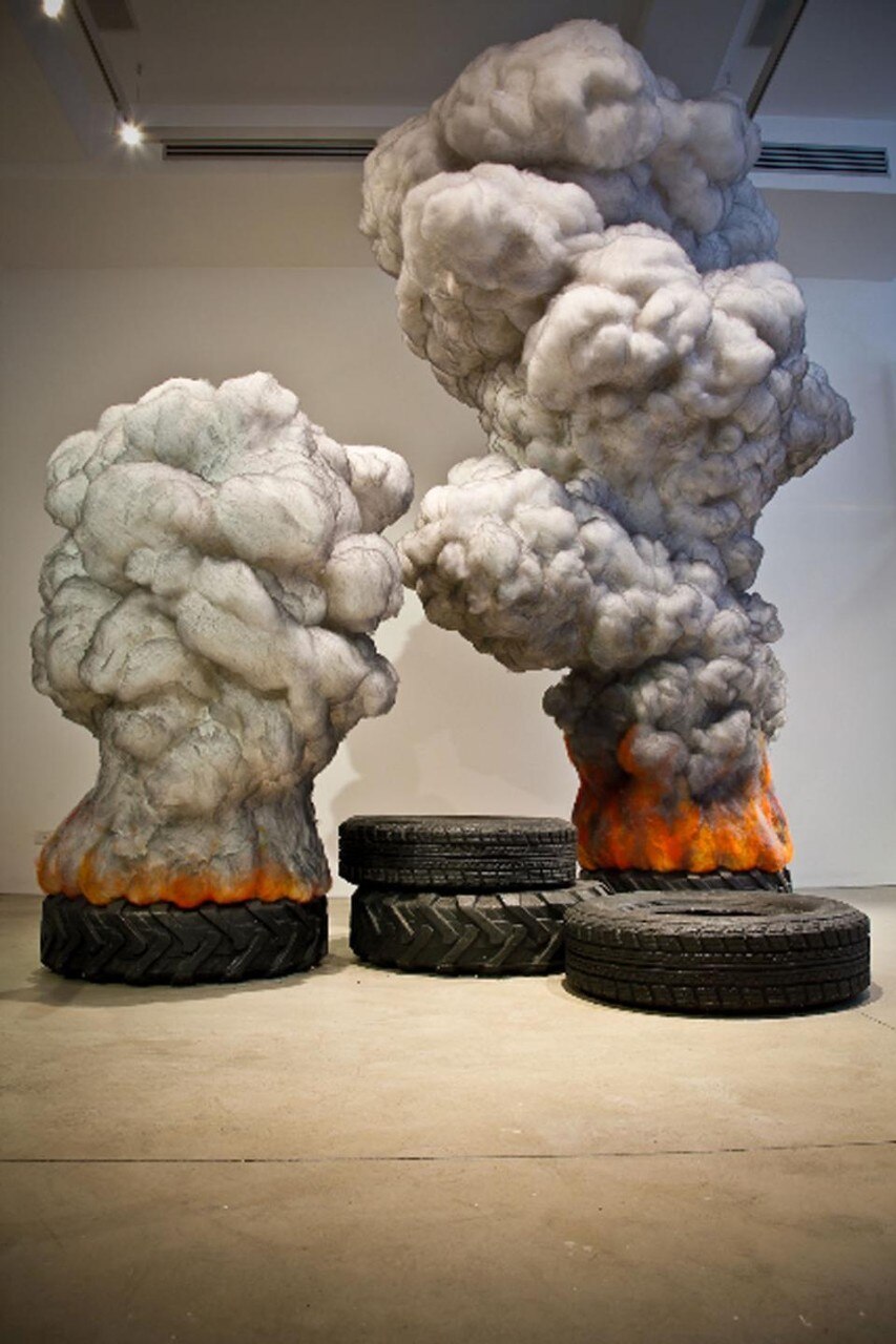<i>Fire Tires</i>, 2010. Cera, styrofoam, fibra di poliestere, fibra.
