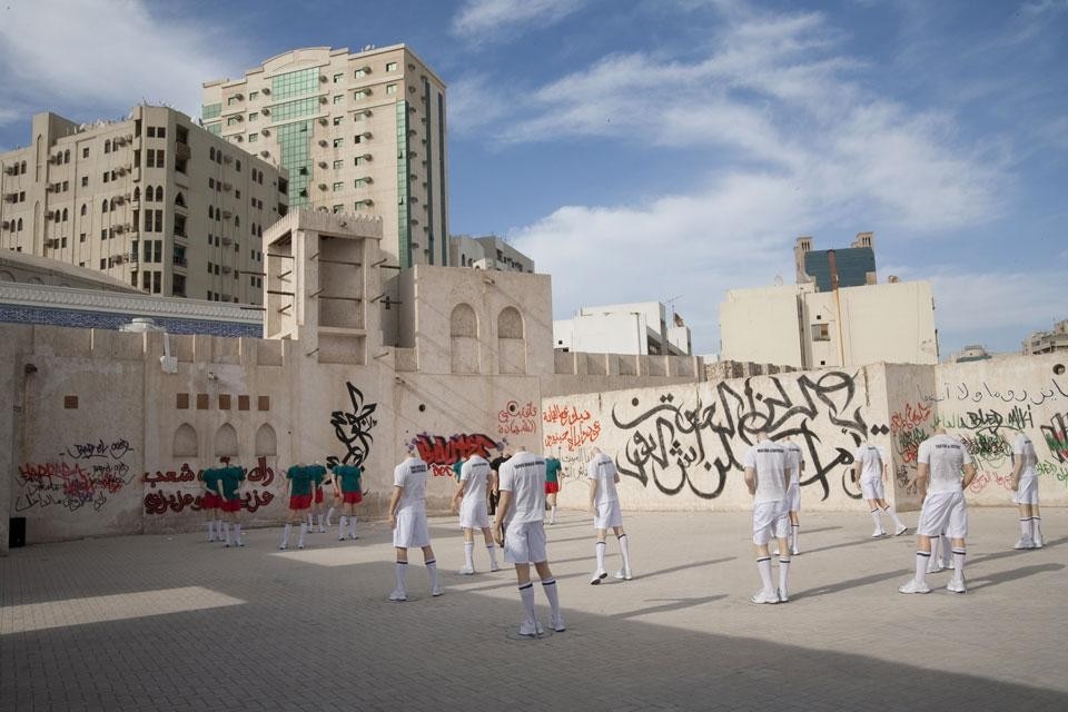 Mustapha Benfodil, <i>Maportaliche / It Has No Importance</i>, 2011. Mixed-media installation, 23 manichini, printed T-shirts, audio, graffiti. Commissione della Sharjah Art Foundation.