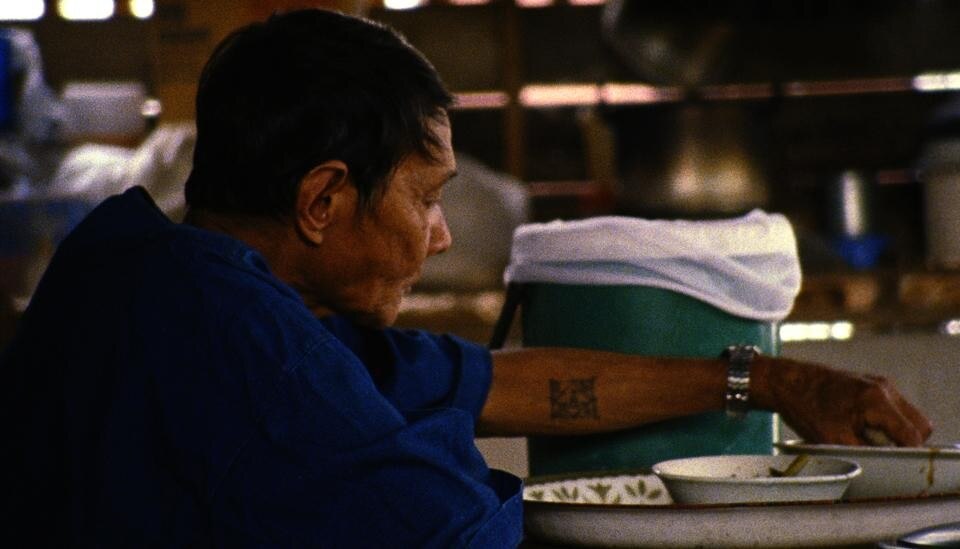 <i>Lung Neaw Visits his Neighbours</i>, 
un film di Rirkrit Tiravanija, S16mm/154 min.
