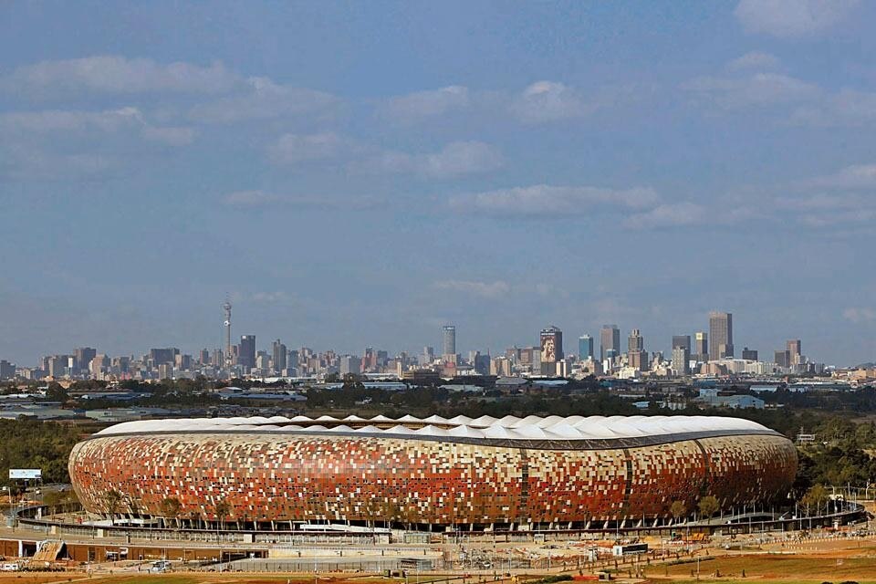 Soccer City
Stadium, Johannesburg, ZA. Boogertman Urban Edge
+ Partners, Populous. Soccer City
Stadium, Johannesburg, ZA. Boogertman Urban Edge
+ Partners, Populous.