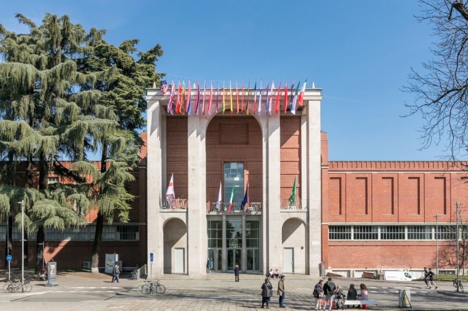 Facade with flags of the Triennale Milano, Triennale Milano, Italy