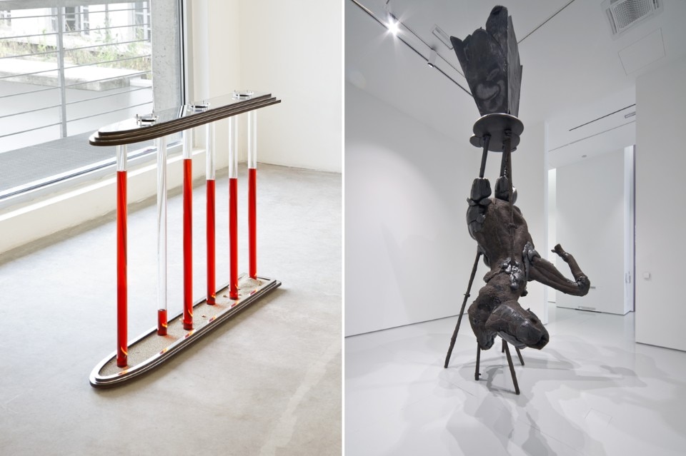 <b>A sinistra</b>: Alessandro Agudio, <i> Mafia Island / Like a woodden spaceship on a brasilian beach</i>, 2013. Plexiglass, conchiglie, sabbia, ferro, Campari, 120 x 87 x 18 cm. <b> A destra</b>: Alis/Filliol, <i>Mofocracy</i>, 2014. Poliuretano espanso, pigmenti, sabbia silicea, argilla, 450 x 200 x 200 cm. Veduta dell'installazione, ZOGO, Museo Ettore Fico, Torino, 2014. Courtesy of the artists e Pinksummer, Genova. Photo: Beppe Giardino