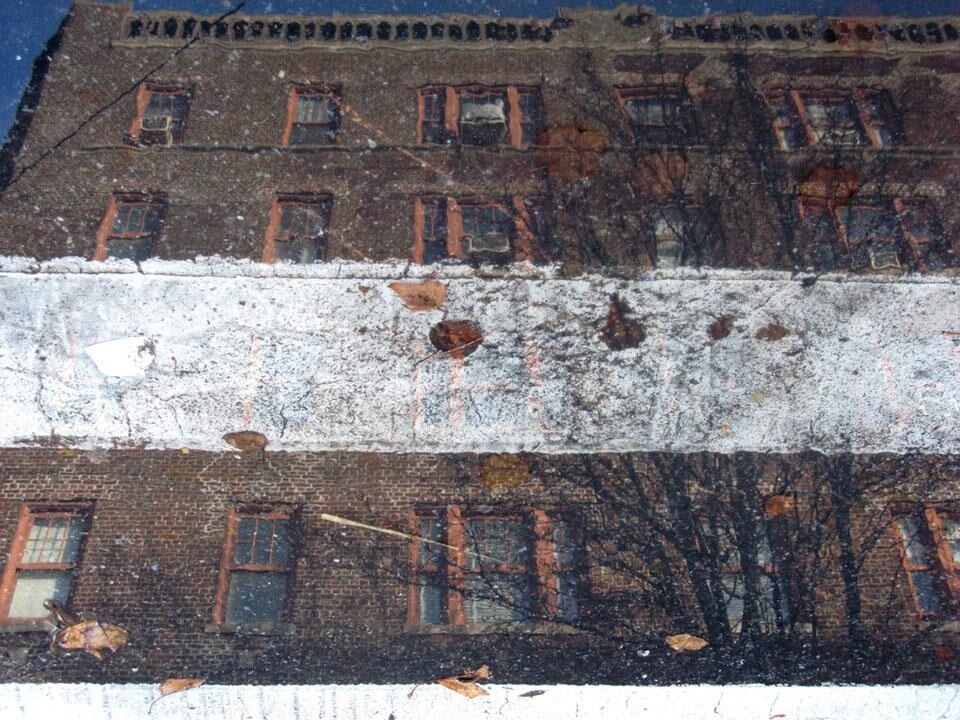 Monica Castiglion, <i>A glimpse in the puddle, Downtown New York</i>